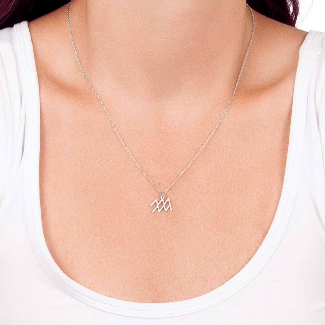 Zodiac Name Necklace. Handcrafted with care, this piece is made from durable stainless steel and optionally dipped in 18k yellow gold and features her unique astrological sign