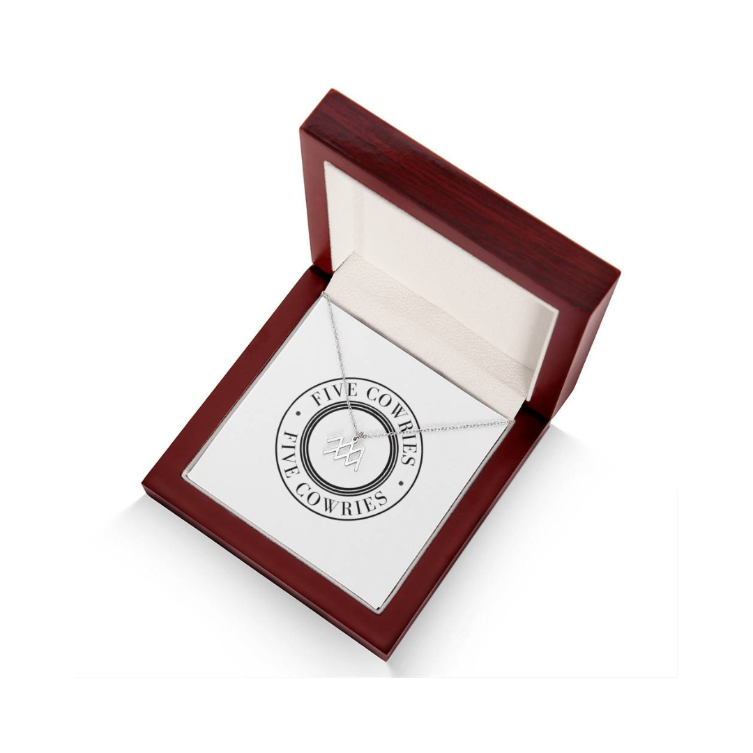 Zodiac Name Necklace. Handcrafted with care, this piece is made from durable stainless steel and optionally dipped in 18k yellow gold and features her unique astrological sign