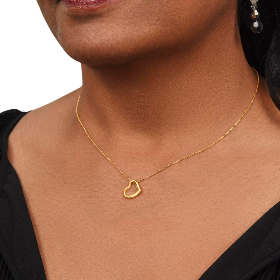 Imagine her delight when she sees this beautiful Delicate Heart Necklace, lovingly crafted in sterling silver and dipped in 14k white gold or 18k yellow gold for added luxury. This piece is pure elegance wrapped up in timeless simplicity. Trends may come and go, but this piece will last a lifetime with its classic subtle beauty.