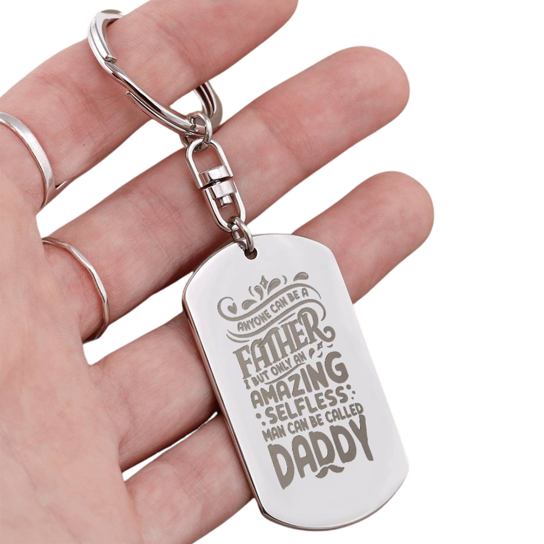 Create a unique keepsake with our Engraved Dog Tag Keychain. This high-quality stainless steel piece can be customized on the back in a scripted font, with 2 lines of text, up to 20 characters each.