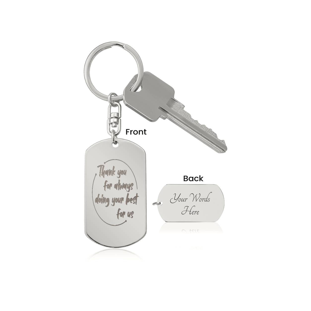 Create a unique keepsake with our Engraved Dog Tag Keychain. This high-quality stainless steel piece can be customized on the back in a scripted font, with 2 lines of text, up to 20 characters each.