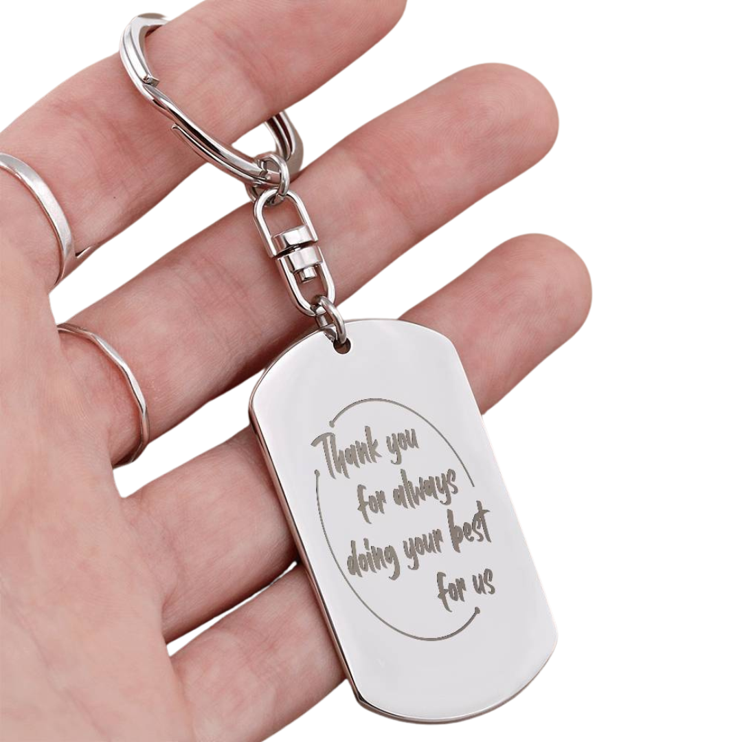 Create a unique keepsake with our Engraved Dog Tag Keychain. This high-quality stainless steel piece can be customized on the back in a scripted font, with 2 lines of text, up to 20 characters each.