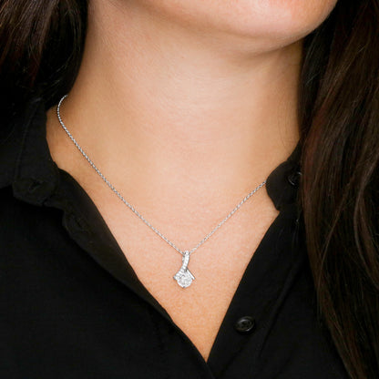 Imagine her reaction when she opens this stunning gift! The Alluring Beauty necklace features a petite ribbon shaped pendant that is sure to dazzle your special someone. Whether it's a birthday or anniversary, make sure to get her a gift she will love for years to come.