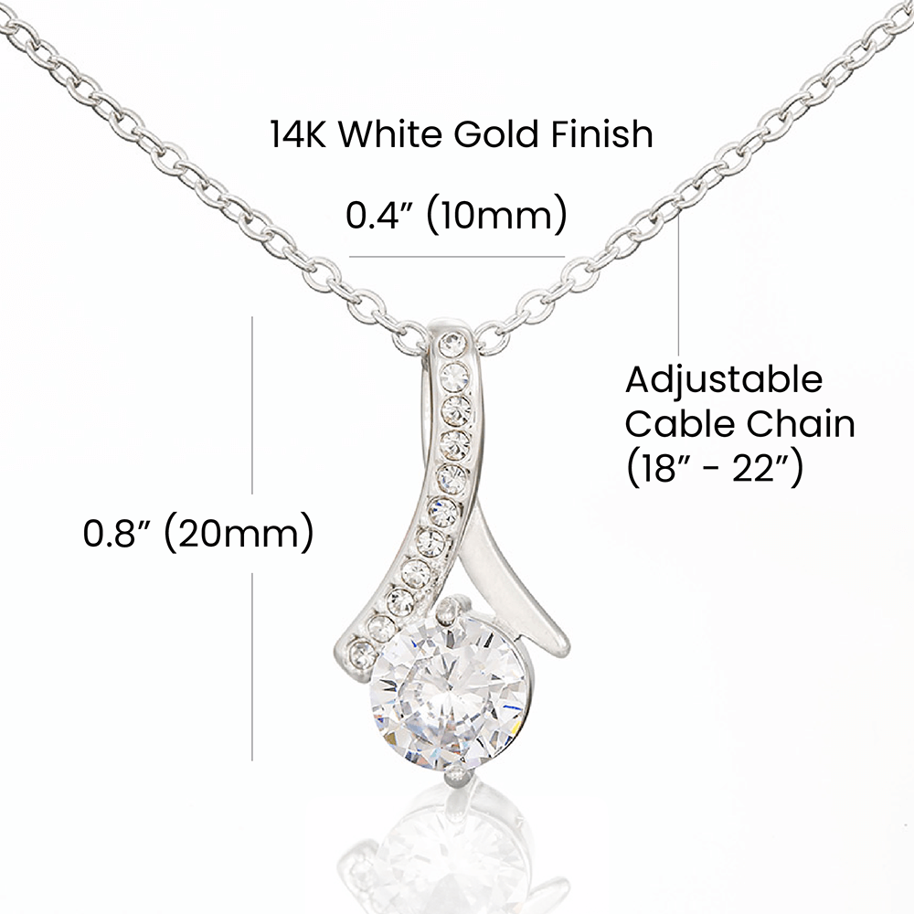 Imagine her reaction when she opens this stunning gift! The Alluring Beauty necklace features a petite ribbon shaped pendant that is sure to dazzle your special someone. Whether it's a birthday or anniversary, make sure to get her a gift she will love for years to come.