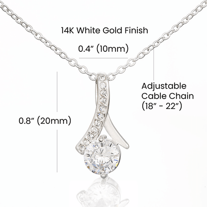 Imagine her reaction when she opens this stunning gift! The Alluring Beauty necklace features a petite ribbon shaped pendant that is sure to dazzle your special someone. Whether it's a birthday or anniversary, make sure to get her a gift she will love for years to come.