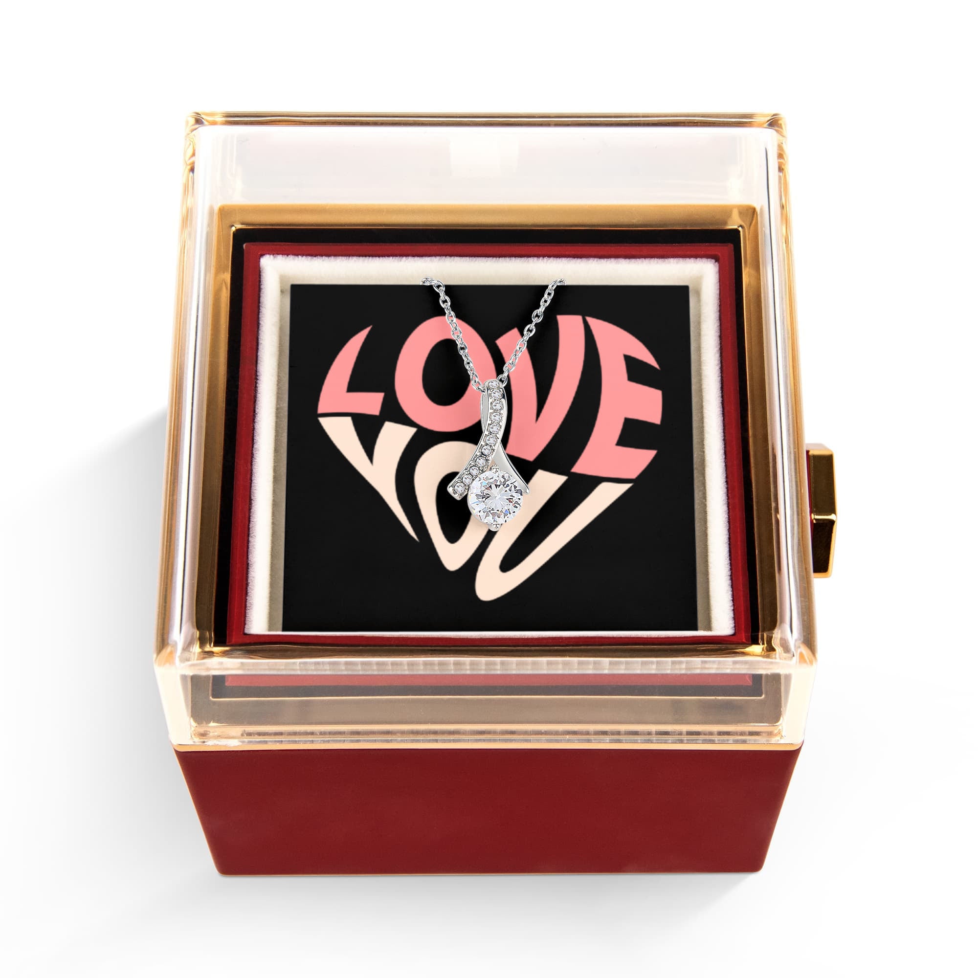 Imagine her reaction as she receives this beautiful Alluring Beauty Necklace. The luxurious box, featuring a charming preserved rose that never fades, adds an extra touch of love. With a simple turn of the gold knob, her breathtaking gift is revealed—making it the perfect sentimental gift for that special someone.