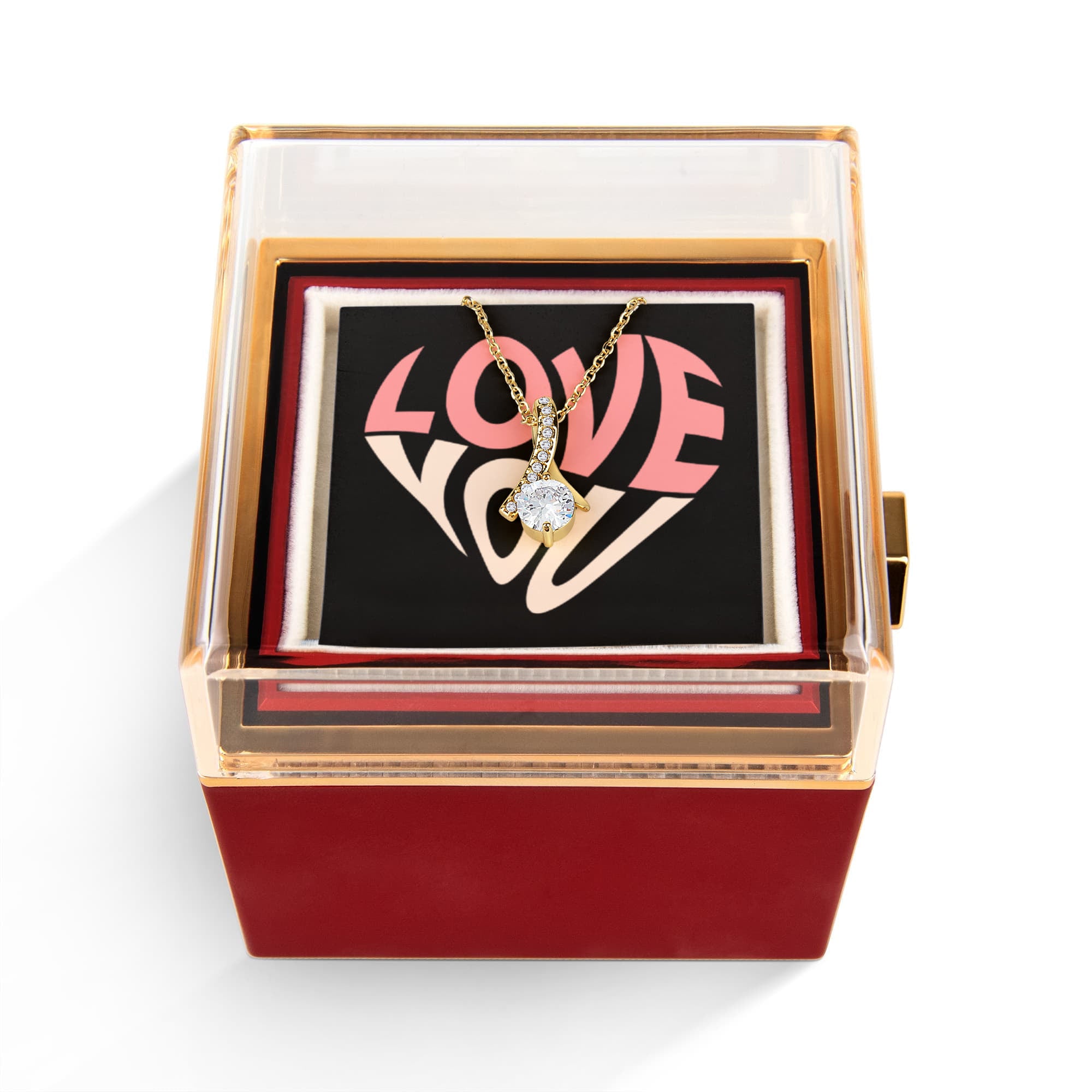 Imagine her reaction as she receives this beautiful Alluring Beauty Necklace. The luxurious box, featuring a charming preserved rose that never fades, adds an extra touch of love. With a simple turn of the gold knob, her breathtaking gift is revealed—making it the perfect sentimental gift for that special someone.