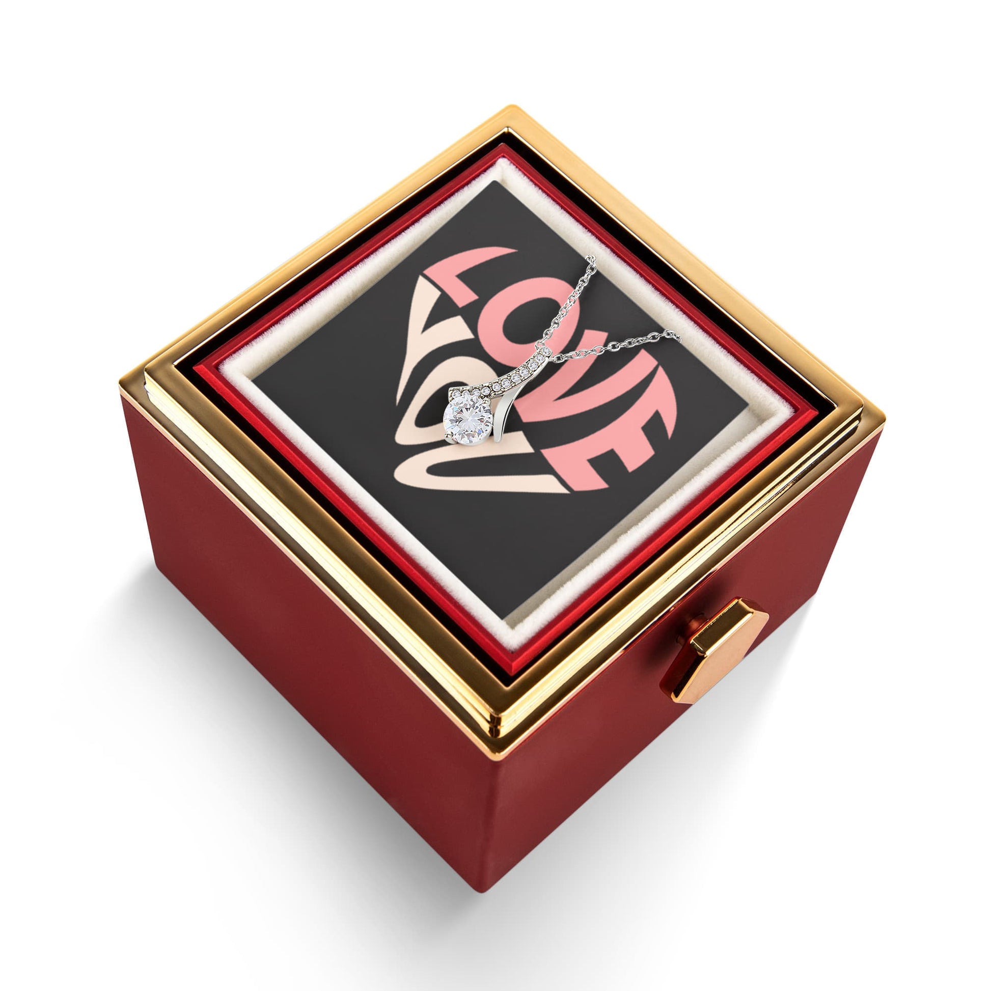 Imagine her reaction as she receives this beautiful Alluring Beauty Necklace. The luxurious box, featuring a charming preserved rose that never fades, adds an extra touch of love. With a simple turn of the gold knob, her breathtaking gift is revealed—making it the perfect sentimental gift for that special someone.