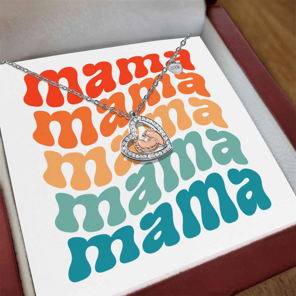 Imagine her reaction receiving this heartfelt symbol of love, family, and precious beginnings. The Baby Feet Heart Necklace features a sparkling heart-shaped frame adorned with shimmering cubic zirconia, surrounding a delicate pair of rose gold baby feet.