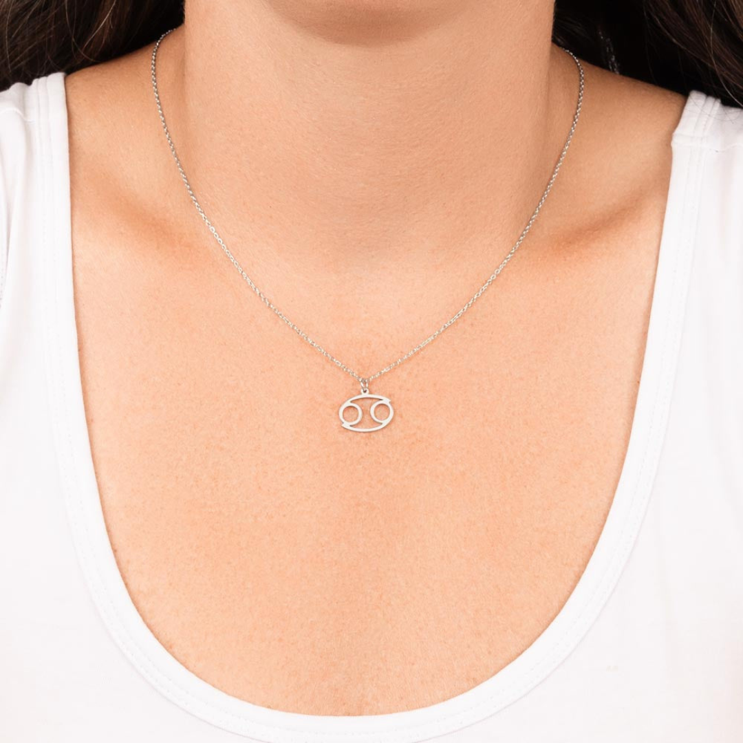 Cancer Zodiac Name Necklace. Handcrafted with care, this piece is made from durable stainless steel and optionally dipped in 18k yellow gold and features her unique astrological sign.