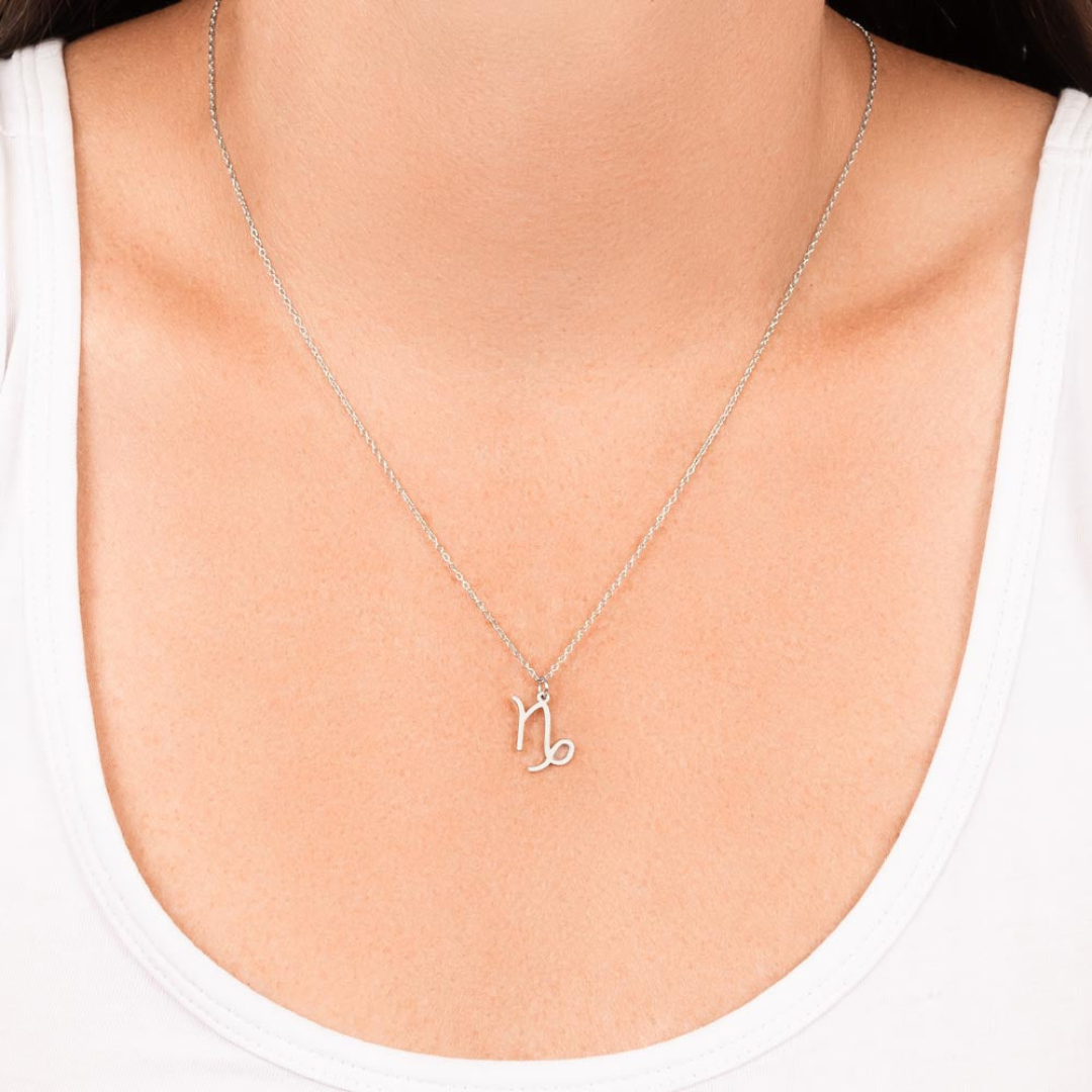 Capricorn Zodiac Name Necklace. Handcrafted with care, this piece is made from durable stainless steel and optionally dipped in 18k yellow gold and features her unique astrological sign.
