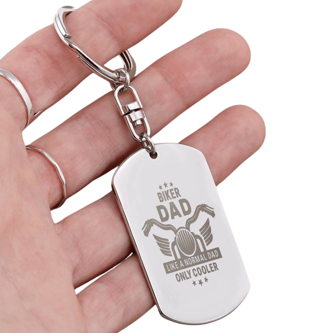 Create a unique keepsake with our Engraved Dog Tag Keychain. This high-quality stainless steel piece can be customized on the back in a scripted font, with 2 lines of text, up to 20 characters each.