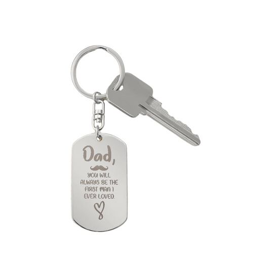 Create a unique keepsake with our Engraved Dog Tag Keychain. This high-quality stainless steel piece can be customized on the back in a scripted font, with 2 lines of text, up to 20 characters each.