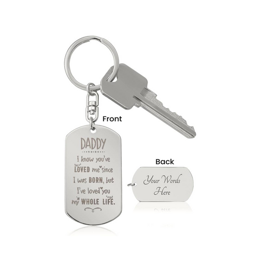 Create a unique keepsake with our Engraved Dog Tag Keychain. This high-quality stainless steel piece can be customized on the back in a scripted font, with 2 lines of text, up to 20 characters each.