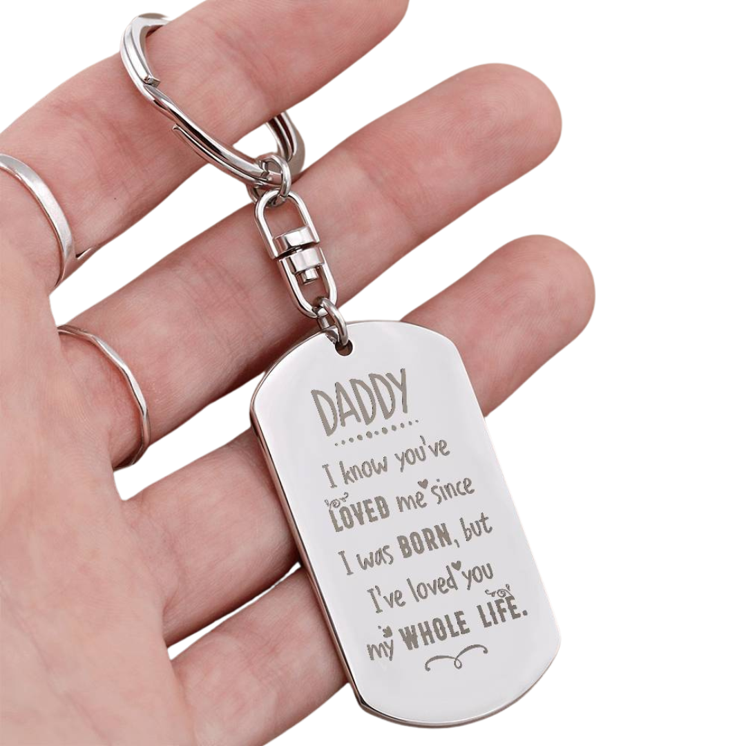 Create a unique keepsake with our Engraved Dog Tag Keychain. This high-quality stainless steel piece can be customized on the back in a scripted font, with 2 lines of text, up to 20 characters each.