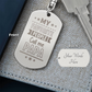 Create a unique keepsake with our Engraved Dog Tag Keychain. This high-quality stainless steel piece can be customized on the back in a scripted font, with 2 lines of text, up to 20 characters each.