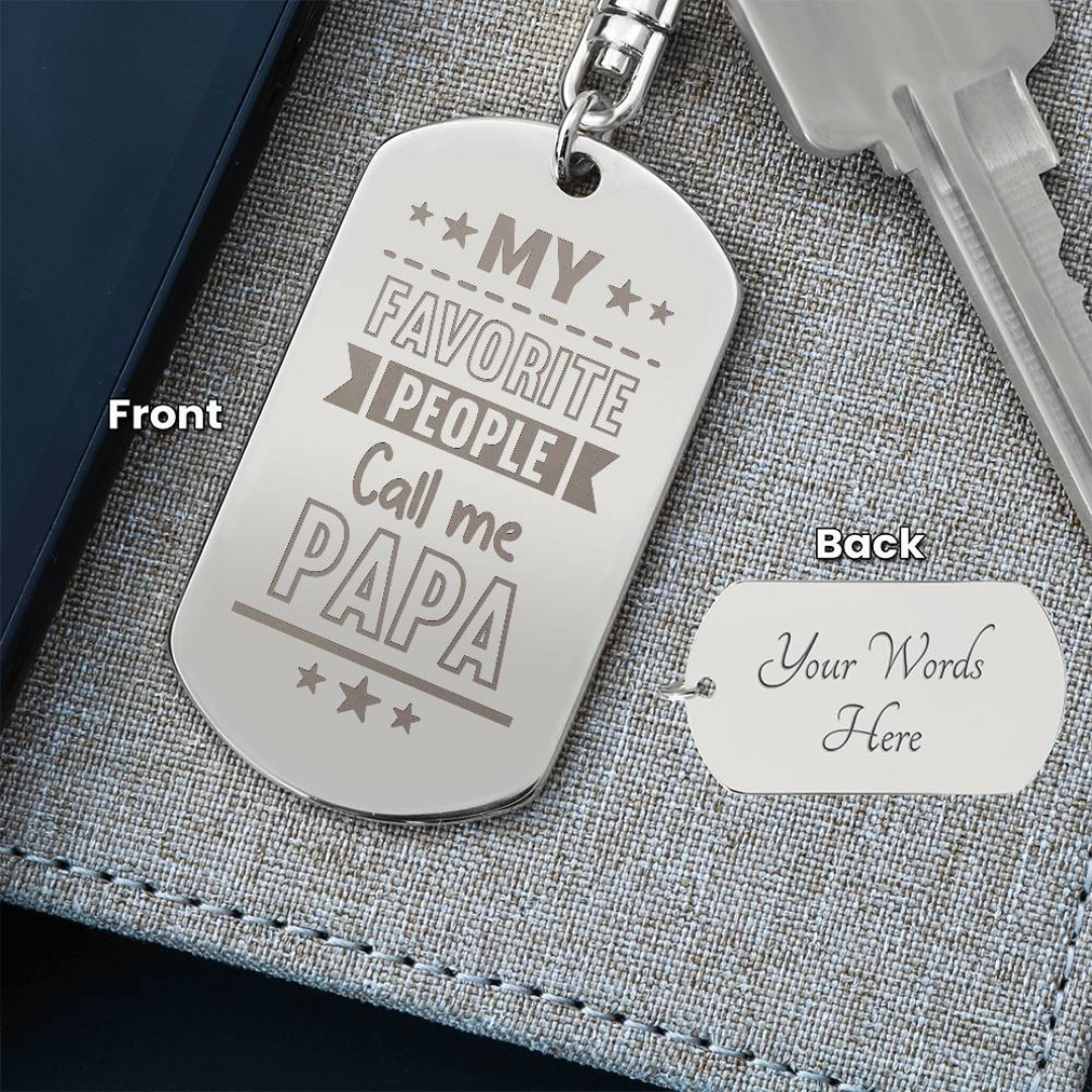 Create a unique keepsake with our Engraved Dog Tag Keychain. This high-quality stainless steel piece can be customized on the back in a scripted font, with 2 lines of text, up to 20 characters each.