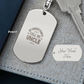 Create a unique keepsake with our Engraved Dog Tag Keychain. This high-quality stainless steel piece can be customized on the back in a scripted font, with 2 lines of text, up to 20 characters each.