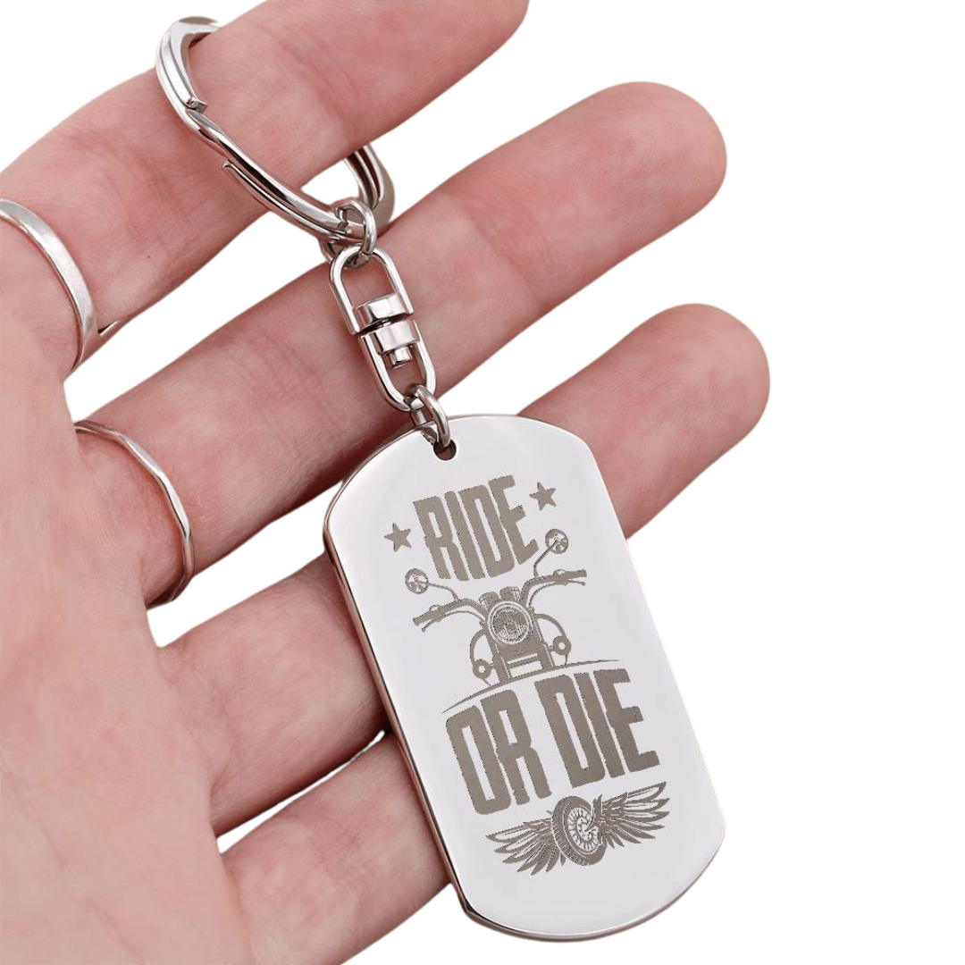 Create a unique keepsake with our Engraved Dog Tag Keychain. This high-quality stainless steel piece can be customized on the back in a scripted font, with 2 lines of text, up to 20 characters each.