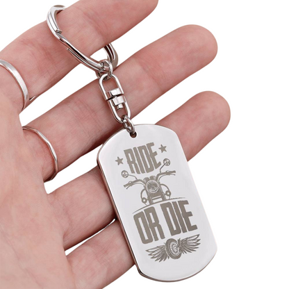 Create a unique keepsake with our Engraved Dog Tag Keychain. This high-quality stainless steel piece can be customized on the back in a scripted font, with 2 lines of text, up to 20 characters each.
