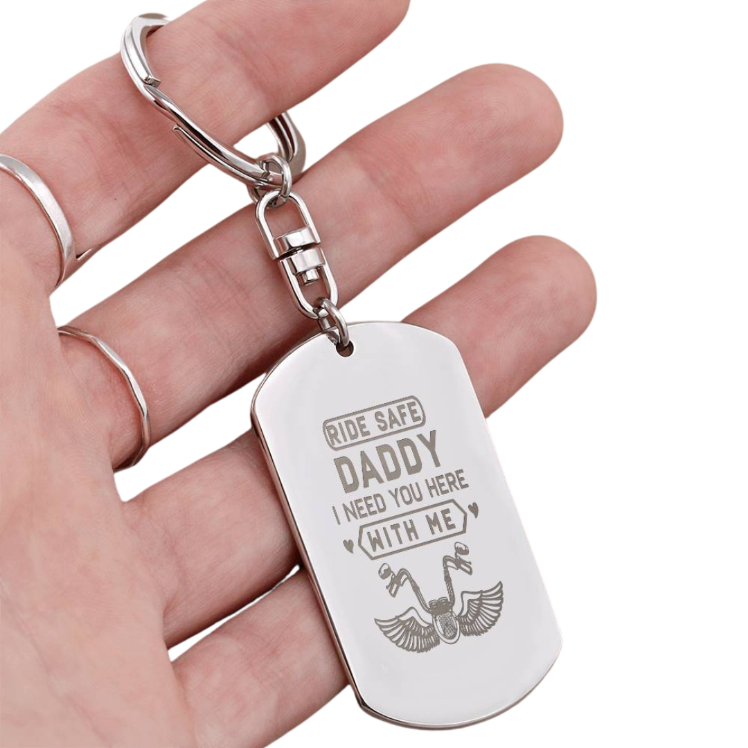 Create a unique keepsake with our Engraved Dog Tag Keychain. This high-quality stainless steel piece can be customized on the back in a scripted font, with 2 lines of text, up to 20 characters each.
