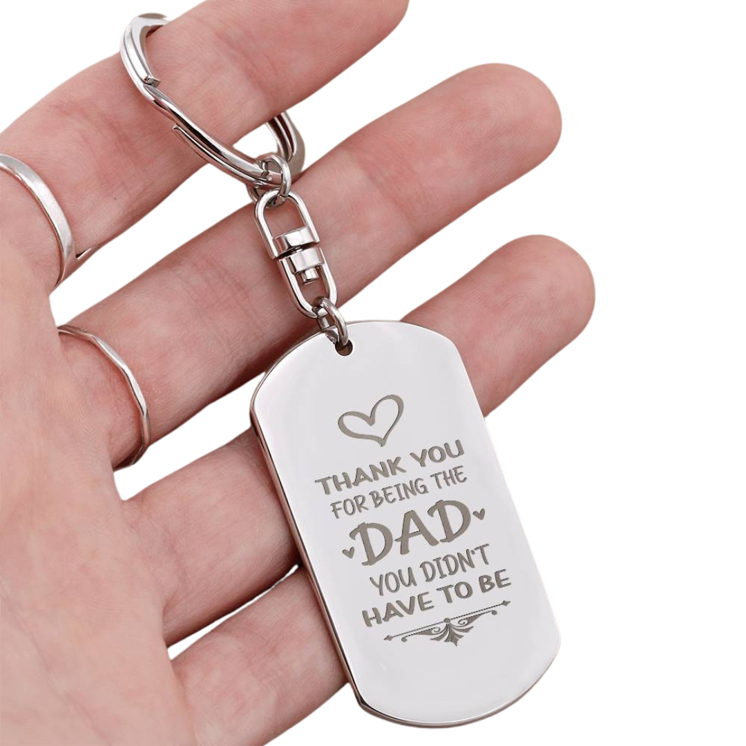 Create a unique keepsake with our Engraved Dog Tag Keychain. This high-quality stainless steel piece can be customized on the back in a scripted font, with 2 lines of text, up to 20 characters each.