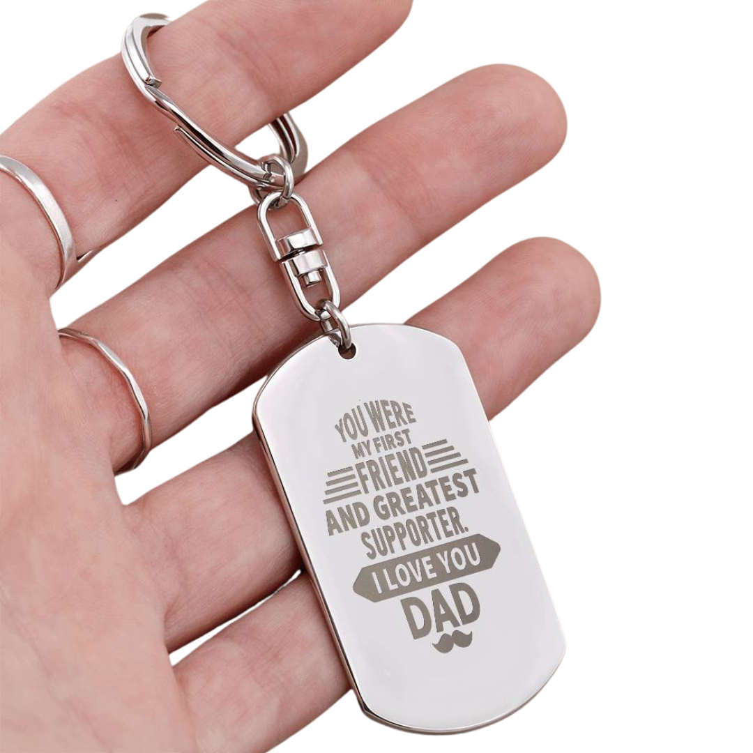 Create a unique keepsake with our Engraved Dog Tag Keychain. This high-quality stainless steel piece can be customized on the back in a scripted font, with 2 lines of text, up to 20 characters each.