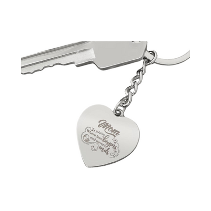 Create a unique keepsake with our Engraved Heart Keychain. This high-quality stainless steel piece can be customized on the back in a scripted font, with 2 lines of text, up to 20 characters each. 