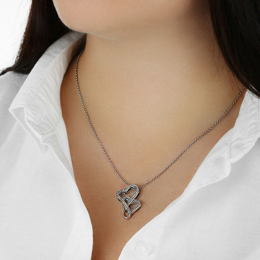 Picture the joy lighting up your loved one's face when they lay eyes on our stunning Heart-to-Heart Pendant Necklace! The intertwined hearts symbolize an unbreakable bond between two souls. Crafted with a touch of magic, this pendant boasts a 14K white gold finish and twinkles with delicate cubic zirconia crystals, adding just the right amount of sparkle. It's effortlessly elegant and elevates any outfit, making it the perfect gift for that special someone!