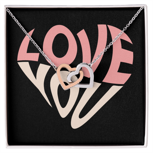 Give her the gift that symbolizes your never-ending love. Featuring two lovely hearts embellished with cubic zirconia crystals, this Interlocking Hearts necklace is the perfect accessory for everyday wear. Whether it's a memorable anniversary or a special birthday, make sure to dazzle your special someone by gifting them this stunning necklace.