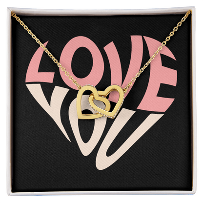 Give her the gift that symbolizes your never-ending love. Featuring two lovely hearts embellished with cubic zirconia crystals, this Interlocking Hearts necklace is the perfect accessory for everyday wear. Whether it's a memorable anniversary or a special birthday, make sure to dazzle your special someone by gifting them this stunning necklace.