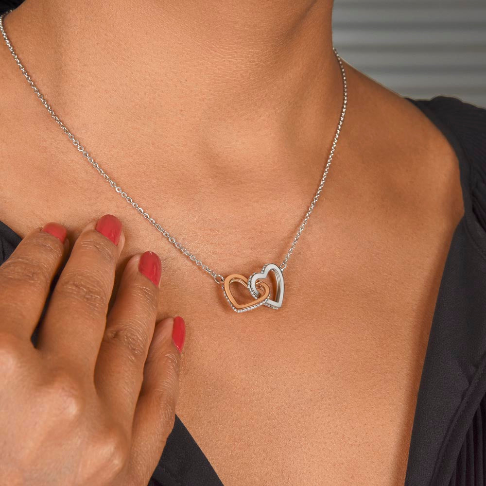 Give her the gift that symbolizes your never-ending love. Featuring two lovely hearts embellished with cubic zirconia crystals, this Interlocking Hearts necklace is the perfect accessory for everyday wear. Whether it's a memorable anniversary or a special birthday, make sure to dazzle your special someone by gifting them this stunning necklace.