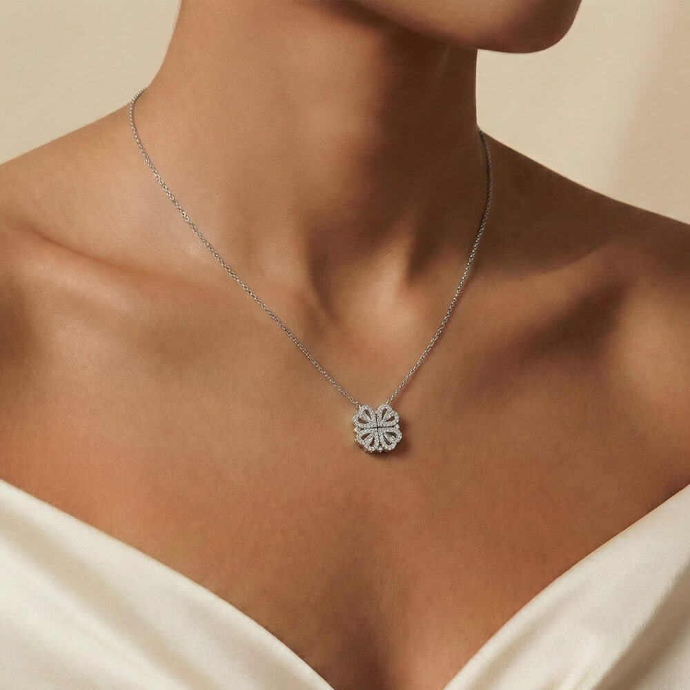 The Magnetic Hearts Necklace features four crystal-embellished hearts that come together to form a beautiful lucky clover. The hidden magnetic design allows each heart to connect seamlessly—symbolizing connection, unity, and the moments that bring us together.