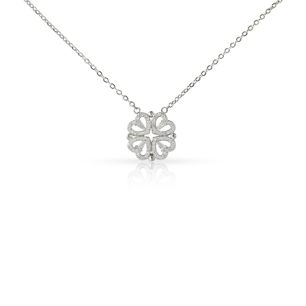 The Magnetic Hearts Necklace features four crystal-embellished hearts that come together to form a beautiful lucky clover. The hidden magnetic design allows each heart to connect seamlessly—symbolizing connection, unity, and the moments that bring us together.