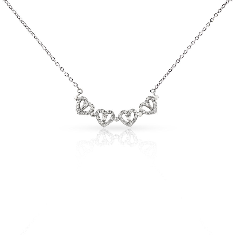 The Magnetic Hearts Necklace features four crystal-embellished hearts that come together to form a beautiful lucky clover. The hidden magnetic design allows each heart to connect seamlessly—symbolizing connection, unity, and the moments that bring us together.
