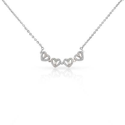 The Magnetic Hearts Necklace features four crystal-embellished hearts that come together to form a beautiful lucky clover. The hidden magnetic design allows each heart to connect seamlessly—symbolizing connection, unity, and the moments that bring us together.