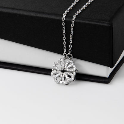 The Magnetic Hearts Necklace features four crystal-embellished hearts that come together to form a beautiful lucky clover. The hidden magnetic design allows each heart to connect seamlessly—symbolizing connection, unity, and the moments that bring us together.