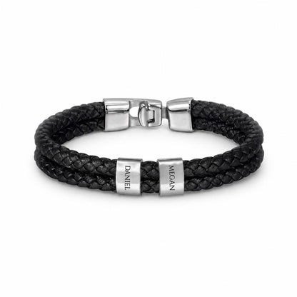 Whether it's for a milestone anniversary, a first Father’s Day, or just because—this bracelet says everything you feel, beautifully.
The Mens Personalized Name Bracelet is a sophisticated tribute to the bonds that matter most. At its center, custom-engraved beads sit nestled against a rugged, double-strand braided band.