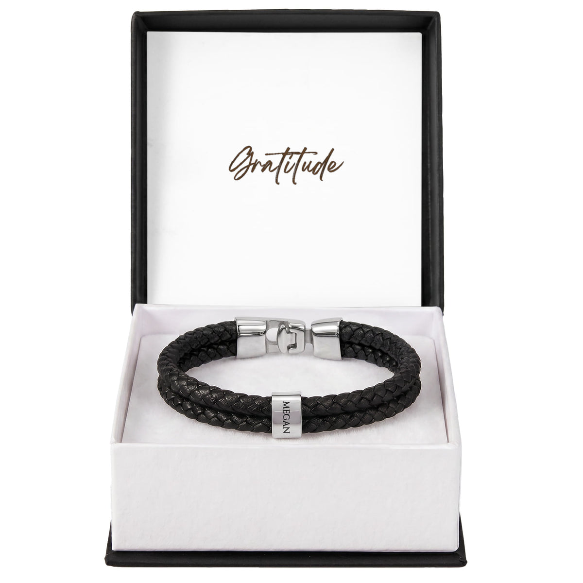 Whether it's for a milestone anniversary, a first Father’s Day, or just because—this bracelet says everything you feel, beautifully.
The Mens Personalized Name Bracelet is a sophisticated tribute to the bonds that matter most. At its center, custom-engraved beads sit nestled against a rugged, double-strand braided band.