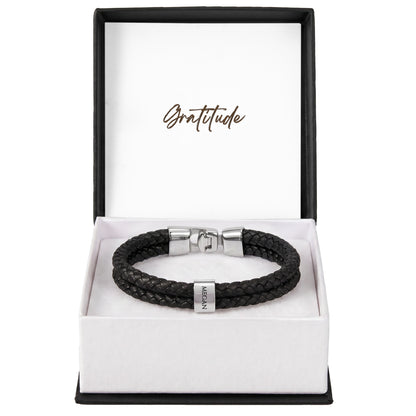 Whether it's for a milestone anniversary, a first Father’s Day, or just because—this bracelet says everything you feel, beautifully.
The Mens Personalized Name Bracelet is a sophisticated tribute to the bonds that matter most. At its center, custom-engraved beads sit nestled against a rugged, double-strand braided band.