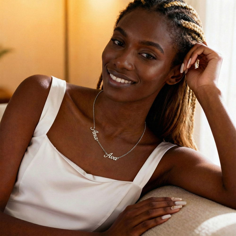 Personalized jewelry that tells a story. Choose up to three names to feature on a delicate adjustable cable chain, crafted in a polished script charm. Available in cool polished stainless steel or warm 18K yellow gold finish — built to last and designed to layer.