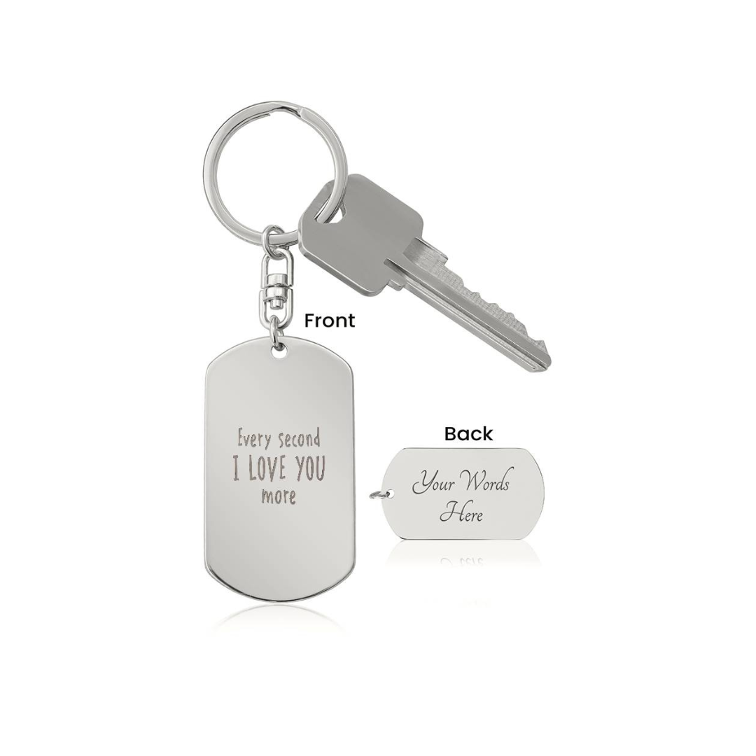 Create a unique keepsake with our Engraved Dog Tag Keychain. This high-quality stainless steel piece can be customized on the back in a scripted font, with 2 lines of text, up to 20 characters each.