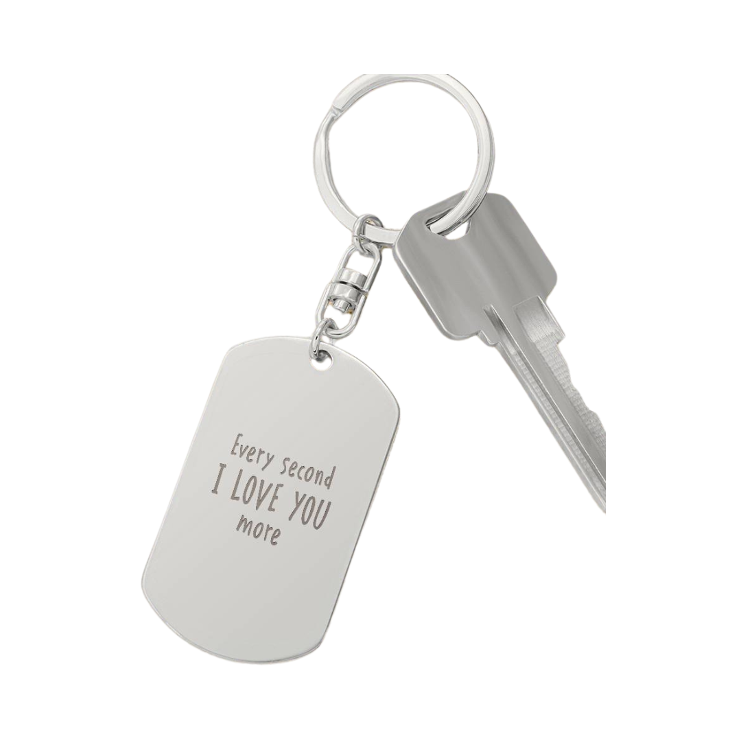Create a unique keepsake with our Engraved Dog Tag Keychain. This high-quality stainless steel piece can be customized on the back in a scripted font, with 2 lines of text, up to 20 characters each.