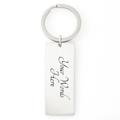 Give a gift that speaks from the heart with this Engraved Rectangle Keychain. Personalize it with a special message, date, or phrase that means the world to your loved one. Each keychain is laser-engraved with care, so your words will never fade. Every time they grab their keys, they’ll think of you.