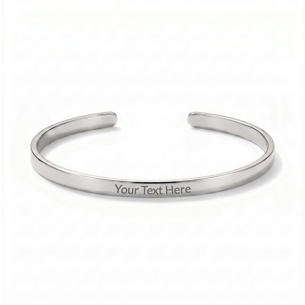 Sleek, modern, and effortlessly sophisticated. The Custom Engraved Cuff Bracelet is a timeless way to keep your most cherished memories, names, or meaningful dates close at hand.