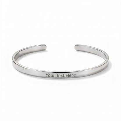 Sleek, modern, and effortlessly sophisticated. The Custom Engraved Cuff Bracelet is a timeless way to keep your most cherished memories, names, or meaningful dates close at hand.