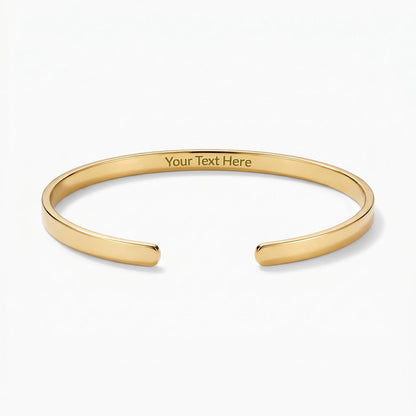 Sleek, modern, and effortlessly sophisticated. The Custom Engraved Cuff Bracelet is a timeless way to keep your most cherished memories, names, or meaningful dates close at hand.
